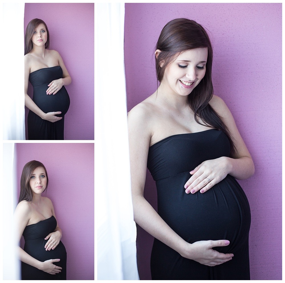 Young pregnant mom posing for a portrait in a window