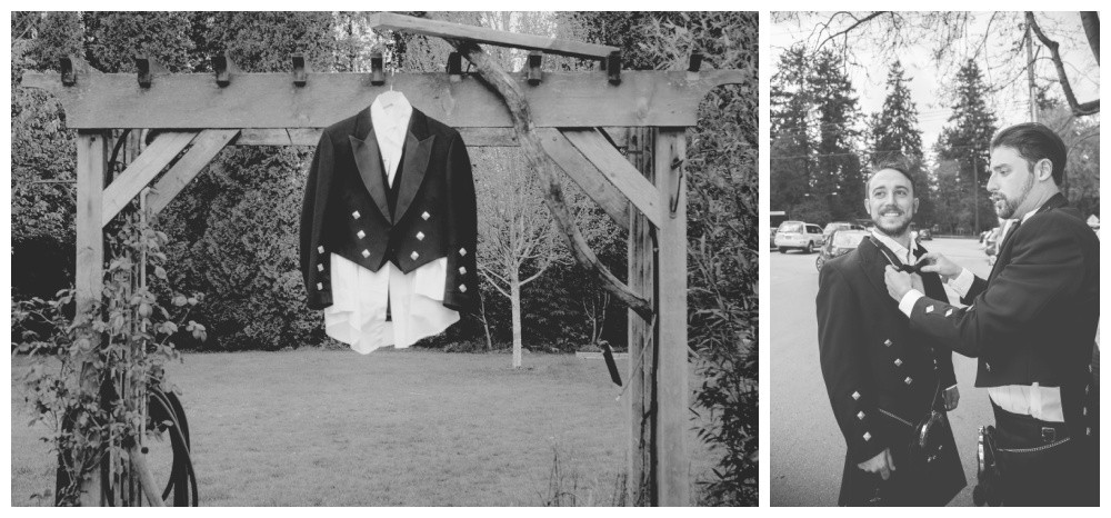 The grooms suit hangs outside on an arbour. 