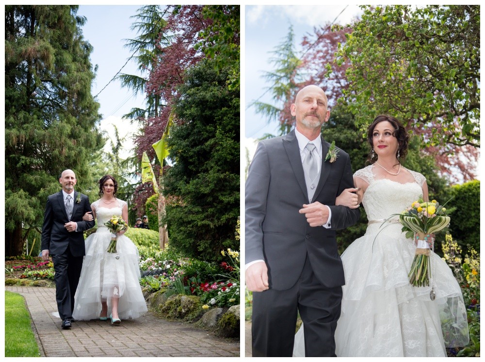 Bride and her father walk down the aisle. 