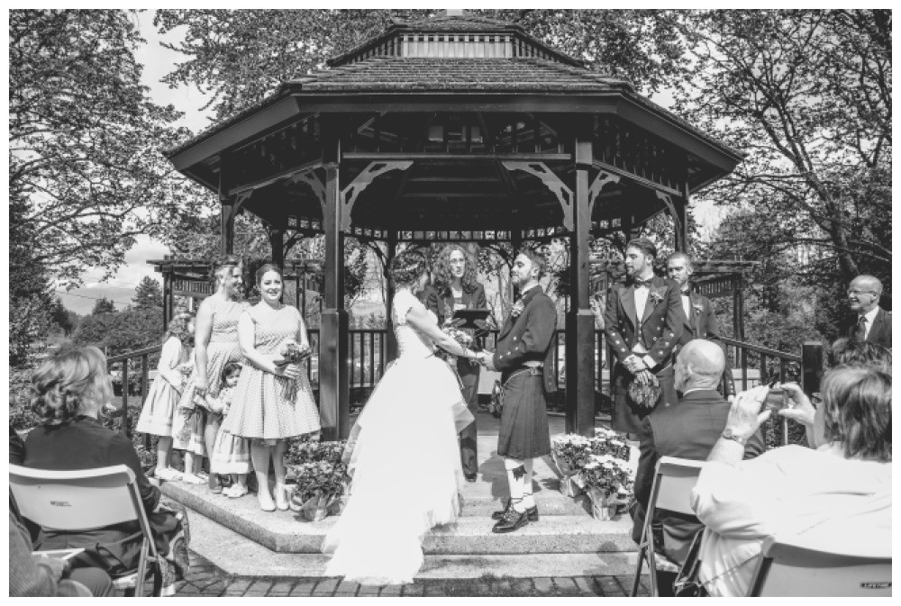 Wedding ceremony at the rose garden gazebo in Queens Park 