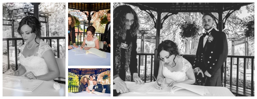 Bride and groom signing wedding paperwork