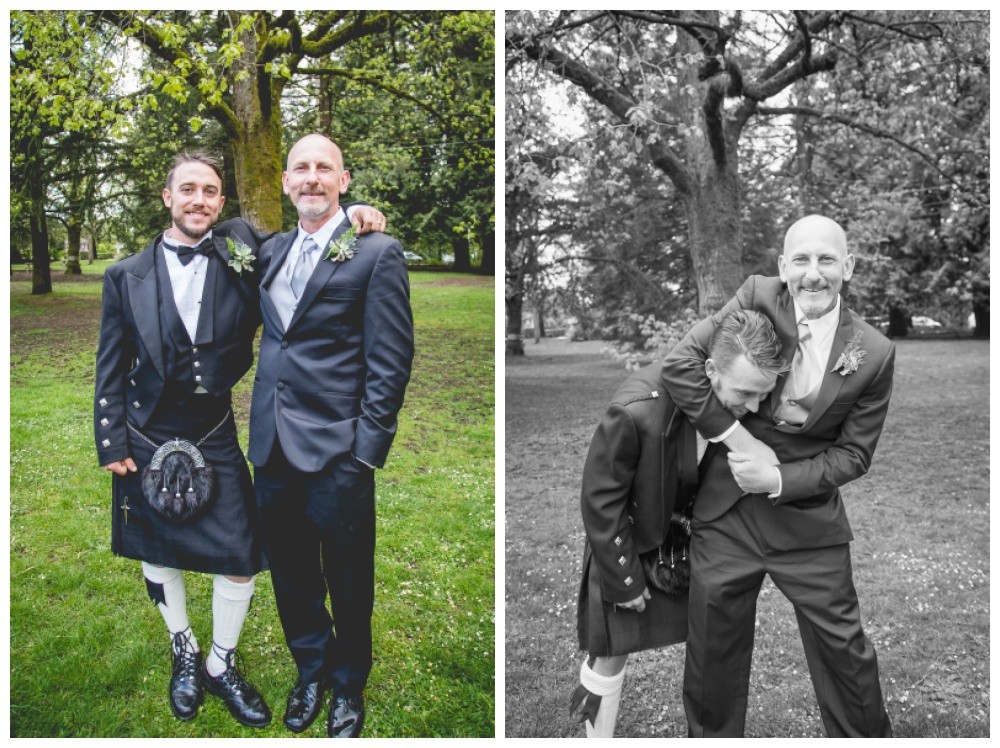 Groom and father in law goof around during family photos 