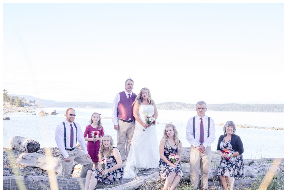 Wedding party photos on Kin Beach in Comox